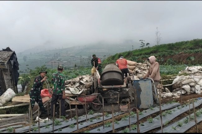 Jalan Mulus Rezeki Mulus" : Permudah Akses Petani Koramil Bantu Pembangunan JUT